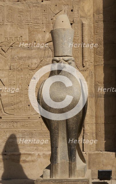 Statue of God Horus wearing the double crown..., Temple of Edfu, Egypt, Ptolemaic period, (2003).  Creator: LTL.