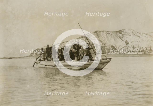 Squad of sappers and miners coming ashore in a sampan at Chemulpo, c1904. Creator: Robert Lee Dunn.
