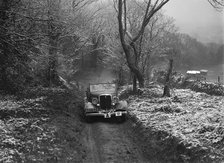 1934 Ford V8 tourer taking part in a motoring trial, late 1930s. Artist: Bill Brunell.