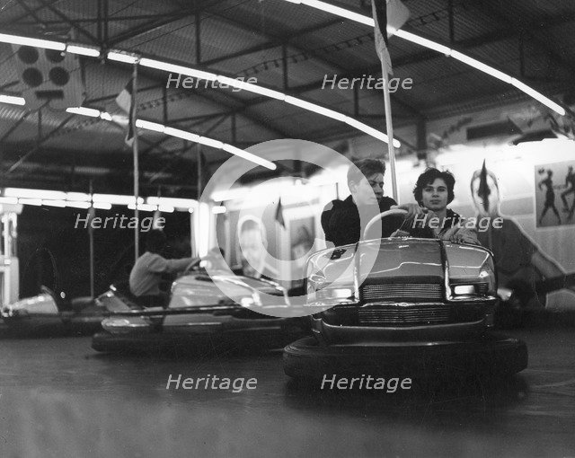 Couple on dodgems, c1960.