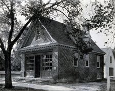 The exterior of a small brick building used as an apothecary shop..., c1900. Creator: Unknown.