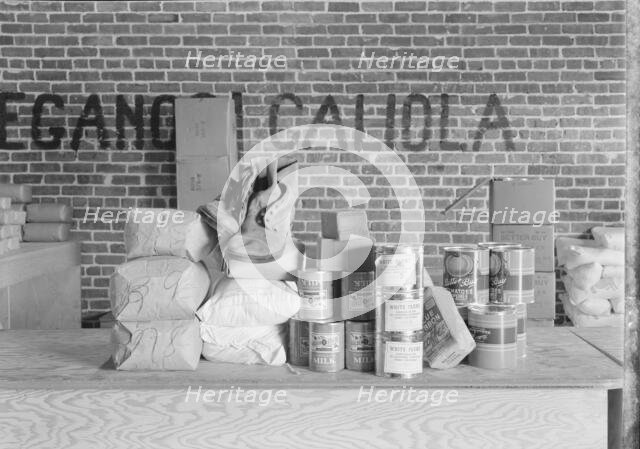 Farm Security Administration (FSA) distributing station, Bakersfield, California, 1938. Creator: Dorothea Lange.