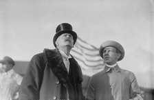 W. Wellman with unidentified gentleman at aviation meet, 1910. Creator: Bain News Service.