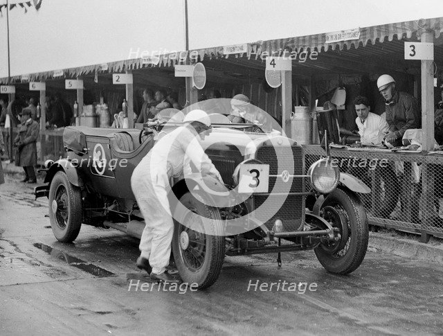 Studebaker of A Hollidge and GAW Laird in the pits at the JCC Double Twelve Race, Brooklands, 1929. Artist: Bill Brunell.