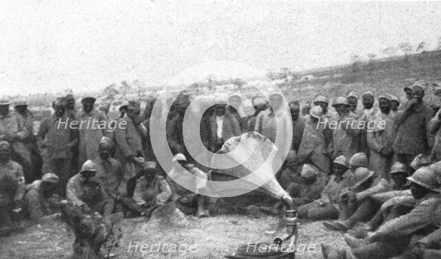 'La Bataille de la Somme; La prise de la Maisonnette: les Senegalais autour d'un phonographe', 1916 Creator: Unknown.
