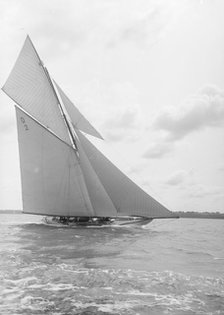 The 15 Metre cutter 'Ostara' sailing close-hauled, 1912. Creator: Kirk & Sons of Cowes.