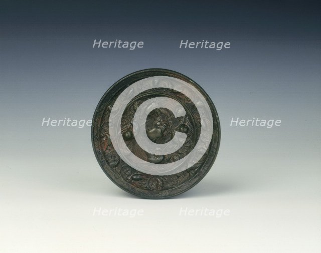 Bronze lion and grapevine mirror, Tang dynasty, China, 618-907 AD. Artist: Unknown