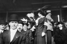 Chorus girl raising money at TITANIC game, 1912. Creator: Bain News Service.