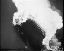 The German Airship, the Hindenburg, its Rear Half Destroyed And Obscured By Smoke With..., 1937. Creator: British Pathe Ltd.