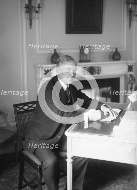 F. Lowden, seated at desk, writing, 1919. Creator: Bain News Service.