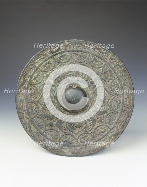 Bronze mirror with dragon and phoenix design, early Six Dynasties period, China, mid 3rd century. Artist: Unknown