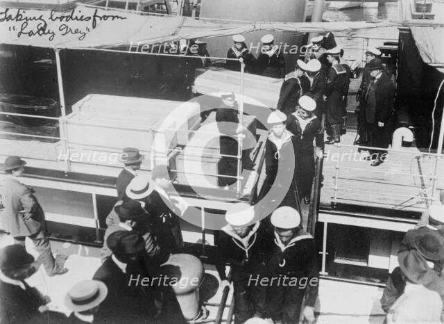 Taking bodies from LADY GREY, 1914. Creator: Bain News Service.