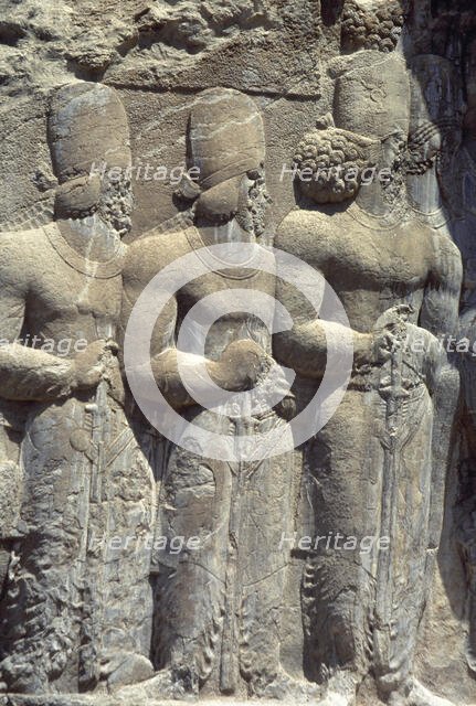 Relief of Shapur's Parade, Sassanian Rock Relief, Naqsh-e Rajab, Fars Province, Iran, (1994). Creator: Unknown.