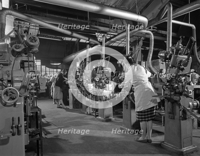 Female workers sharpening saw blades, Sheffield, South Yorkshire, 1963. Artist: Michael Walters