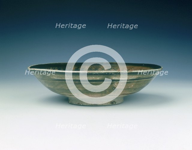 Stoneware bowl with moulded peony scroll and lions, Jin dynasty, China, 13th century. Artist: Unknown