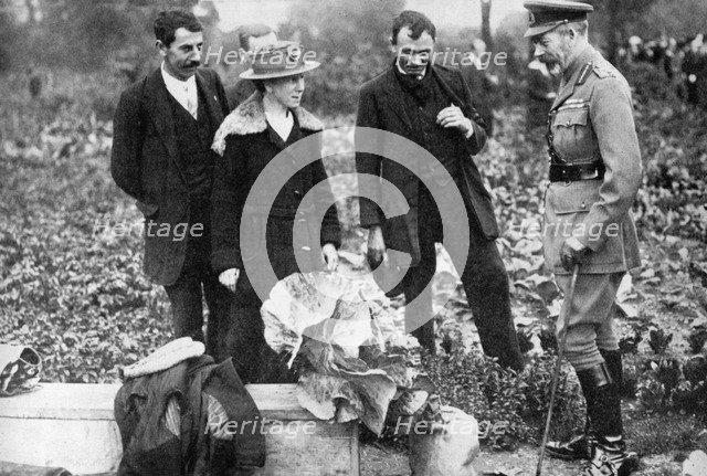 King George V admiring allotments on Clapham Common, London, c1910s-c1920s (1936). Artist: Unknown