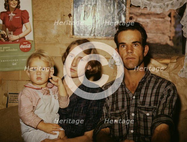 Jack Whinery, homesteader, with his wife and the youngest of his five..., Pie Town, New Mexico, 1940 Creator: Russell Lee.