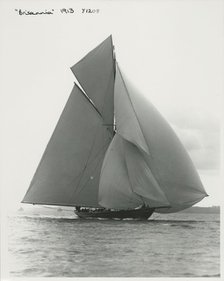 The 221 ton gaff-rigged cutter 'Britannia' sailing under spinnaker, 1913. Creator: Kirk & Sons of Cowes.