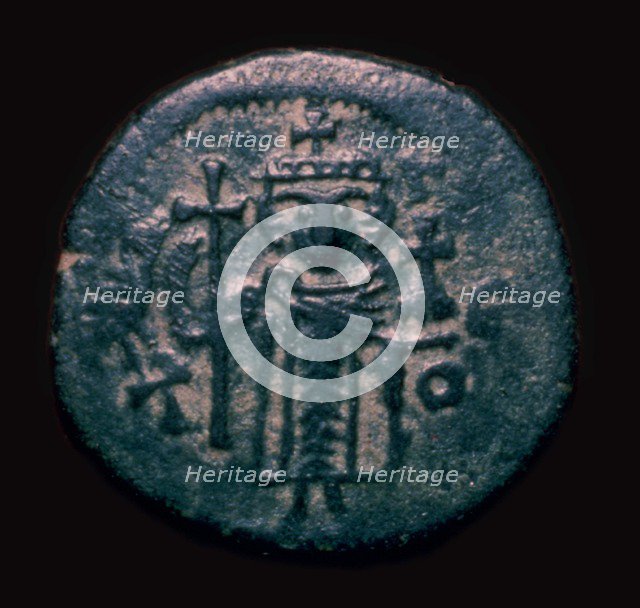 Bronze fals showing a figure holding a cross, 7th century. Artist: Unknown