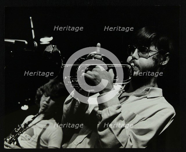 Chris Hunter (saxophone) and Guy Barker (trumpet) playing at The Stables, Wavendon, Buckinghamshire. Artist: Denis Williams