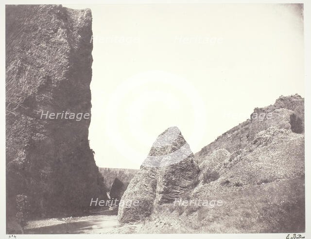 Ruisseau coulant entre une falaise et des rochers, 1854, printed 1978. Creator: Edouard Baldus.