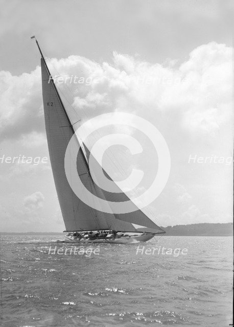 The 23-metre cutter 'Astra' sailing close-hauled, 1931. Creator: Kirk & Sons of Cowes.