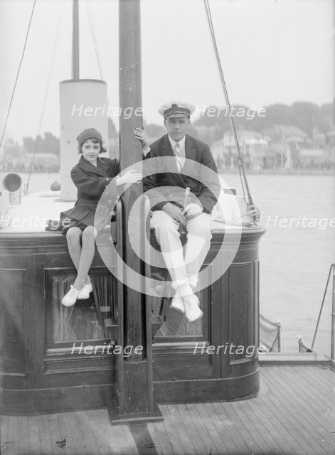 1st Earl of Birkenhead with his daughter on board their yacht, (Isle of Wight?), c1925. Creator: Kirk & Sons of Cowes.