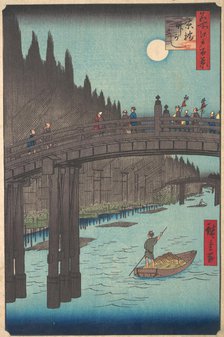 Full Moon Over Canal, with Bridge and Huge Stacks of Bamboo along the Bank, ca. 1857., ca. 1857. Creator: Ando Hiroshige.