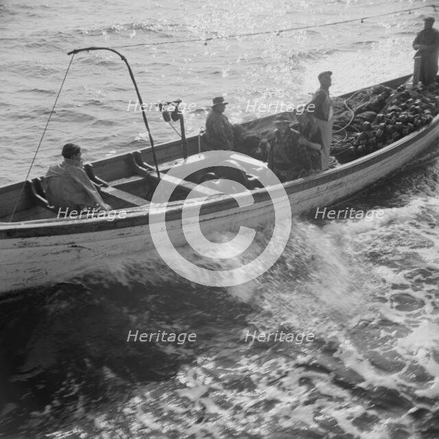 On board the fishing boat Alden, out of Gloucester, Massachusetts, 1943. Creator: Gordon Parks.