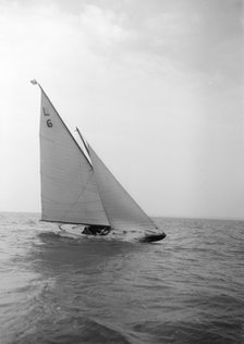 The 6 Metre Class 'The Whim' sailing close-hauled. Creator: Kirk & Sons of Cowes.
