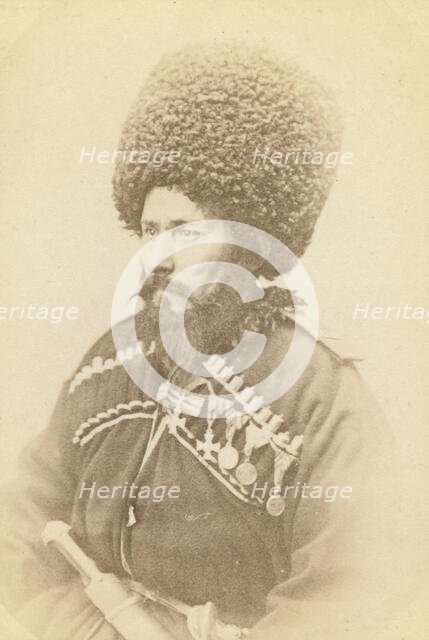 Half-length portrait of Daghestani man, facing left, between 1870 and 1886. Creator: Unknown.