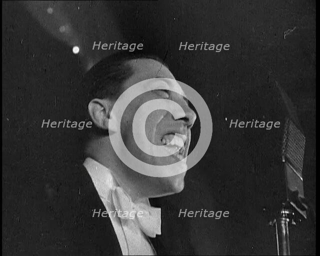 French Actor and Singer, Fernandel Singing a Song, 1930s. Creator: British Pathe Ltd.