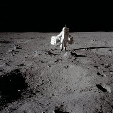Buzz Aldrin carries out an experiment on the lunar surface, Apollo II mission, July 1969.  Creator: Neil Armstrong.