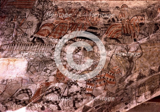 An army marching with the King in front, identified by their heraldic banners as a Catalan Aragon…