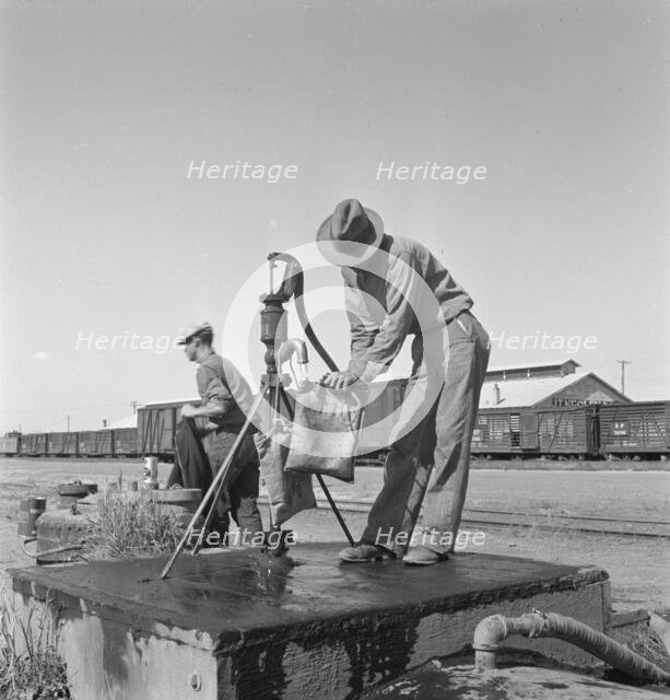 Drinking water for the whole town, also for the..., Tulelake, Siskiyou County, California, 1939. Creator: Dorothea Lange.