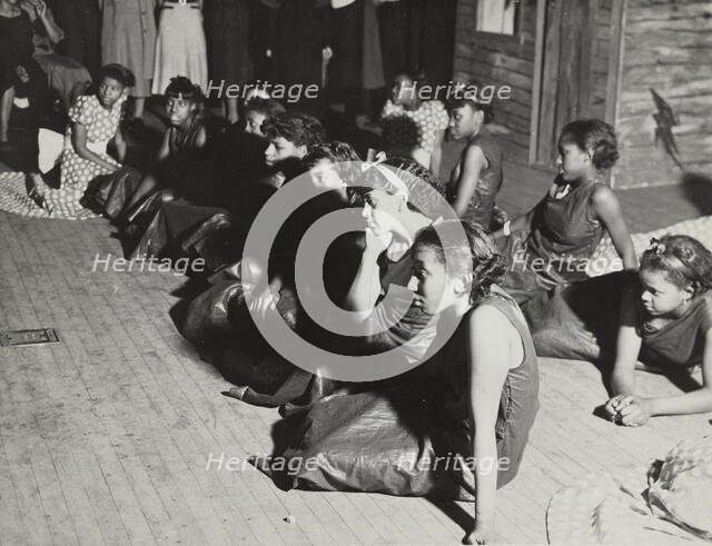 Group receiving instructions for "Cotton Pickin'" scene in "Jacob's Ladder", 1936. Creator: Unknown.