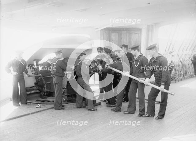 U.S.S. Newark, loading 6-inch gun, between 1891 and 1901. Creator: Unknown.