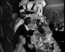 People Eating Dinner, 1930s. Creator: British Pathe Ltd.