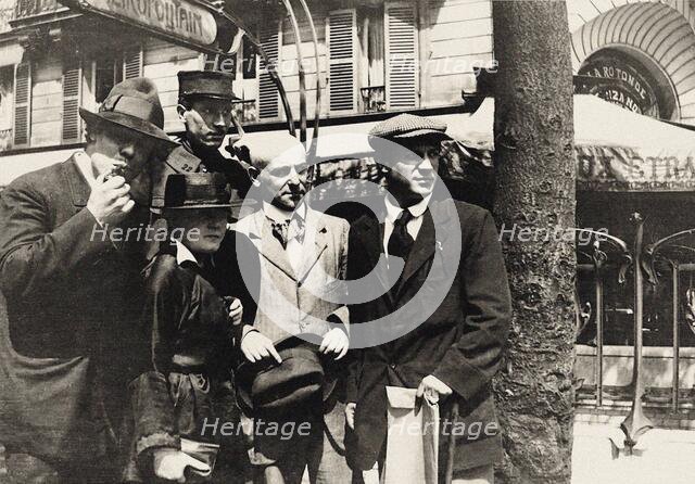 Jean Cocteau, Manuel Ortiz de Zárate, Henri-Pierre Roché, Marie Vassilieff, Max..., 1916. Creator: Anonymous.