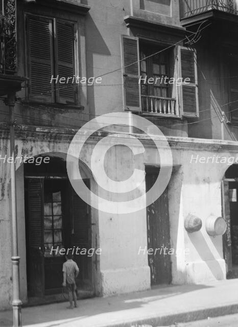 Pedesclaux-Lemonnier House, 640 Royal Street, New Orleans, between 1920 and 1926. Creator: Arnold Genthe.