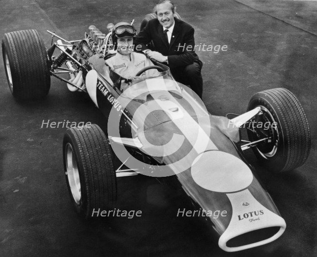 Graham Hill and Colin Chapman with Lotus 49, 1967. Artist: Unknown