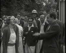 John Bonyton Priestley Tosses a Coin With Gladys Cooper, 1920s. Creator: British Pathe Ltd.