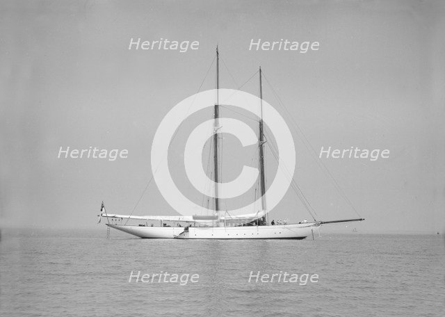 The schooner 'Joyance' at anchor, 1913. Creator: Kirk & Sons of Cowes.