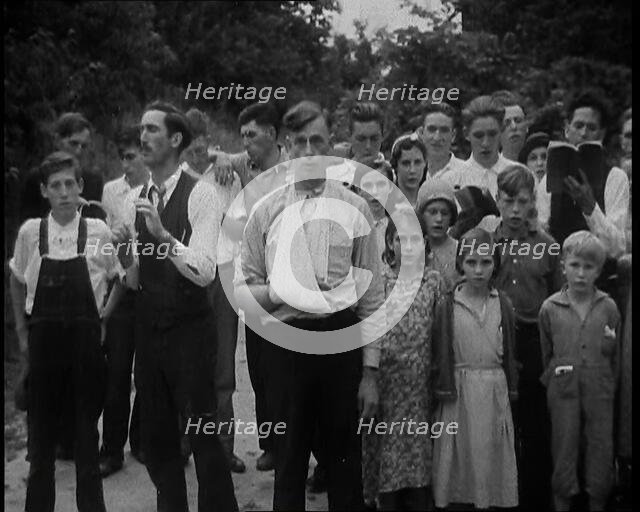 Preacher, Albert Teaster Singing Hymns With a Crowd, 1930s. Creator: British Pathe Ltd.