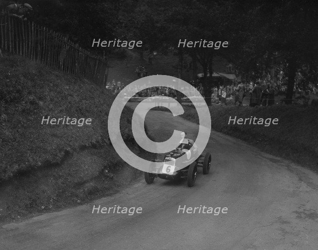 MG R type of Ian Connell competing in the Shelsley Walsh Hillclimb, Worcestershire, 1935. Artist: Bill Brunell.