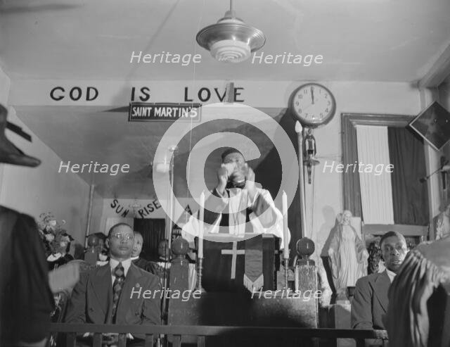 Possibly: Congregation of the St. Martin's Spiritual Church, Washington, D.C., 1942. Creator: Gordon Parks.