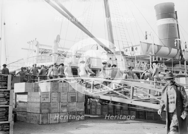 Loading U.S. Army transport ship Meade - League Isl'd., 1913. Creator: Bain News Service.