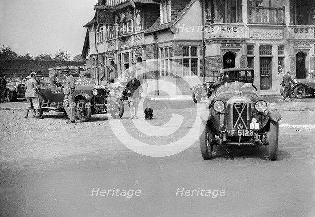 Cars at the North West London Motor Club Trial, Osterley Park Hotel, Isleworth, 1 June 1929. Artist: Bill Brunell.