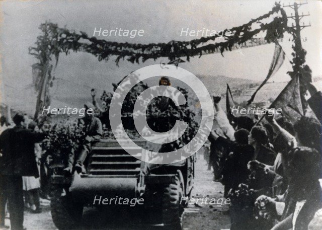 Russian troops entering the village of Dolno Kamartsi, Bulgaria, September 1944. Artist: Unknown