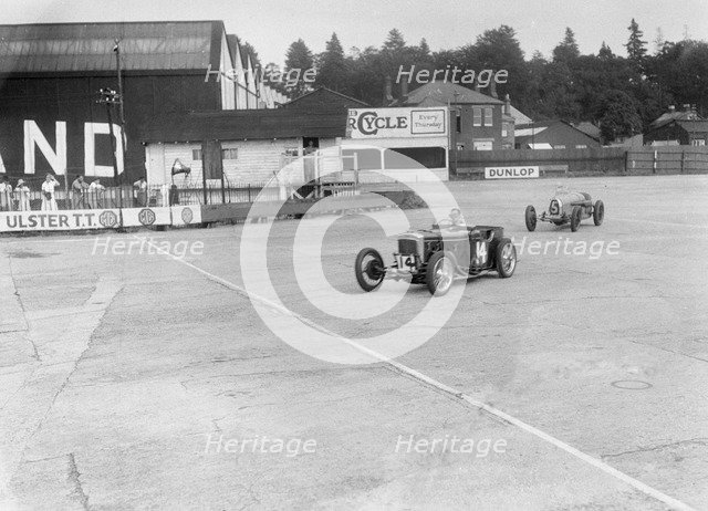 Frazer-Nash of RT Grogan leading Jack Lemon Burton's Bugatti T37, BARC meeting, Brooklands, 1933. Artist: Bill Brunell.